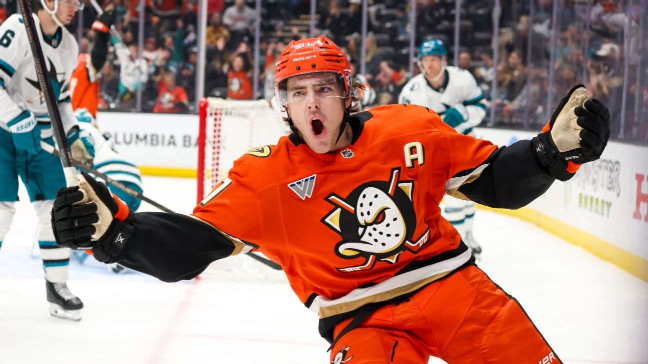 Anaheim Ducks player celebrating in an orange Ducks jersey